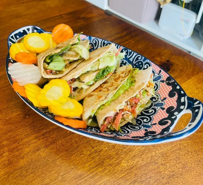 Fresh Rasamrit wraps served with colorful vegetables